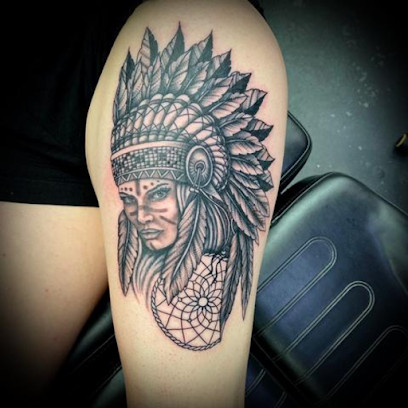 Punktured Tattoo